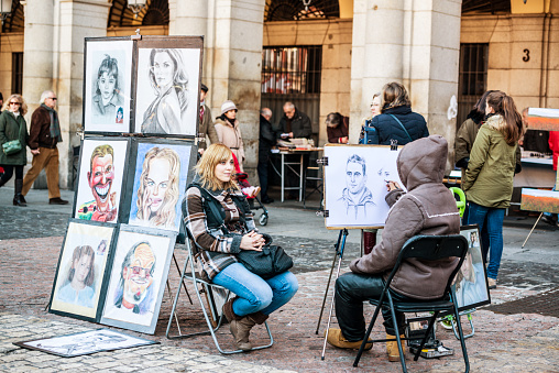 Street Artist drawing portrait, Plaza Mayor, Madrid