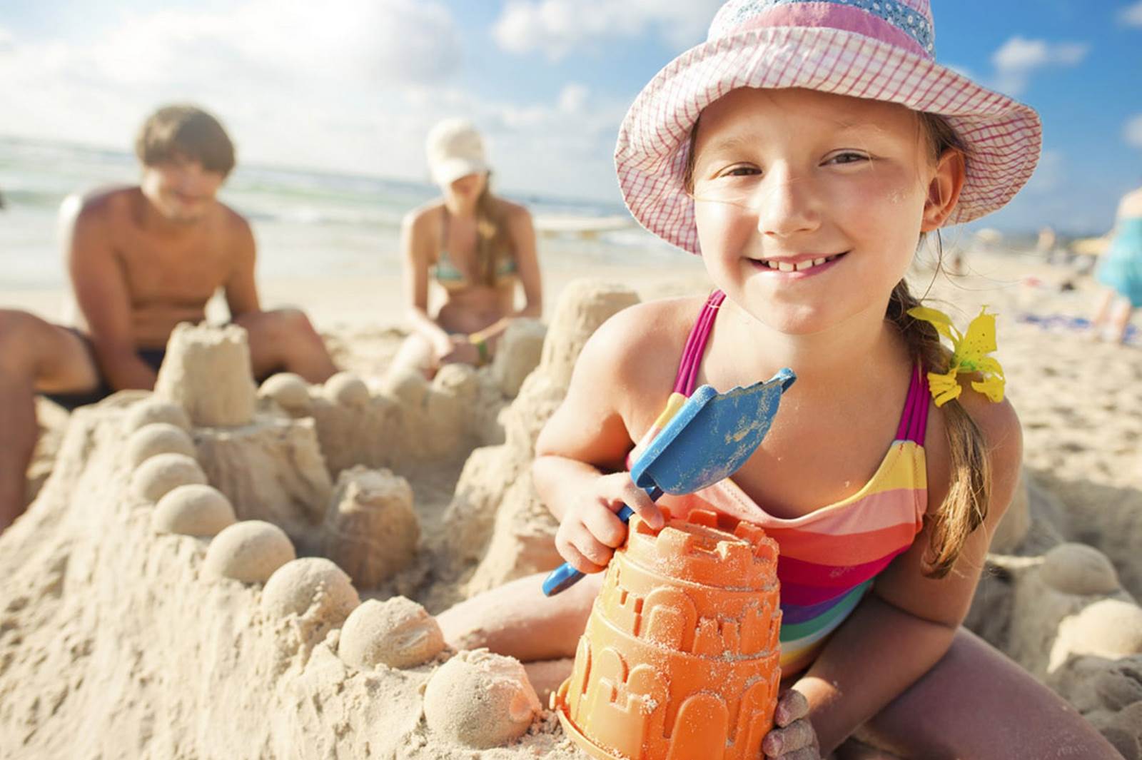 635728667537743721-532730049_a-child-building-a-sand-castle